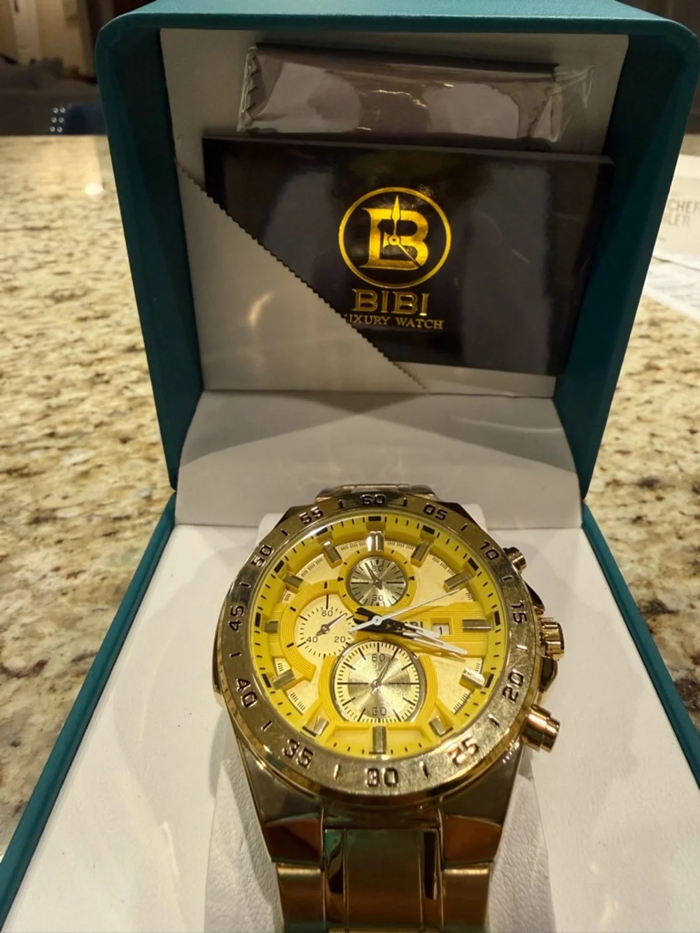 Gold-Tone Chronograph Watch with Yellow Dial